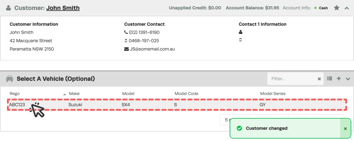 A screenshot of an Invoice's Customer and Vehicle details after assigning a new customer. A Vehicle in the Vehicle list is highlighted and a cursor indicates a click.